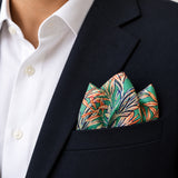 In The Jungle pocket square — navy jacket · alternate fold.