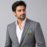 In The Jungle pocket square — model · light grey and open collar.