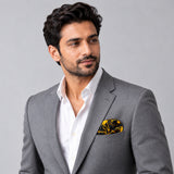 Golden Reverie pocket square — model · light grey and open collar.