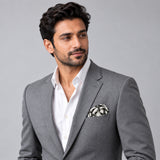 Infinite Geometric Loop pocket square — model · light grey and open collar.