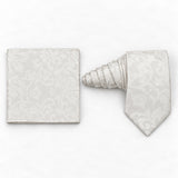 Ivory Scroll Damask silk tie and matching pocket square — Natural coiled pair