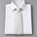 Ivory Scroll Damask Silk Tie — White shirt product flatlay