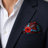 Kaleidoscope pocket square — navy jacket · wearing detail.