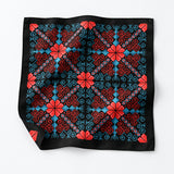 Kaleidoscope pocket square — unfolded studio detail.