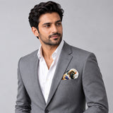 Mandarin Heron White pocket square — model · light grey and open collar.