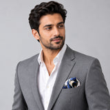 Pakistani Markhor pocket square — model · light grey and open collar.