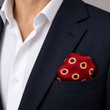 Maroon and Gold Reversible pocket square — navy jacket · wearing detail.