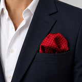 Merlot Mini Polka Dots pocket square — navy jacket · wearing detail.