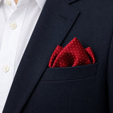 Merlot Mini Polka Dots pocket square — navy jacket · alternate fold.