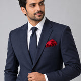 Merlot Mini Polka Dots pocket square — formal model · navy and tie.