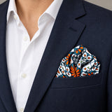 Mexican Floral Loop pocket square — navy jacket · wearing detail.