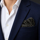Mini Point Black pocket square — navy jacket · wearing detail.