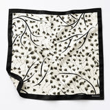 Modern Floral pocket square — unfolded studio detail.