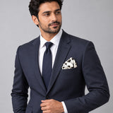 Modern Floral pocket square — formal model · navy and tie.
