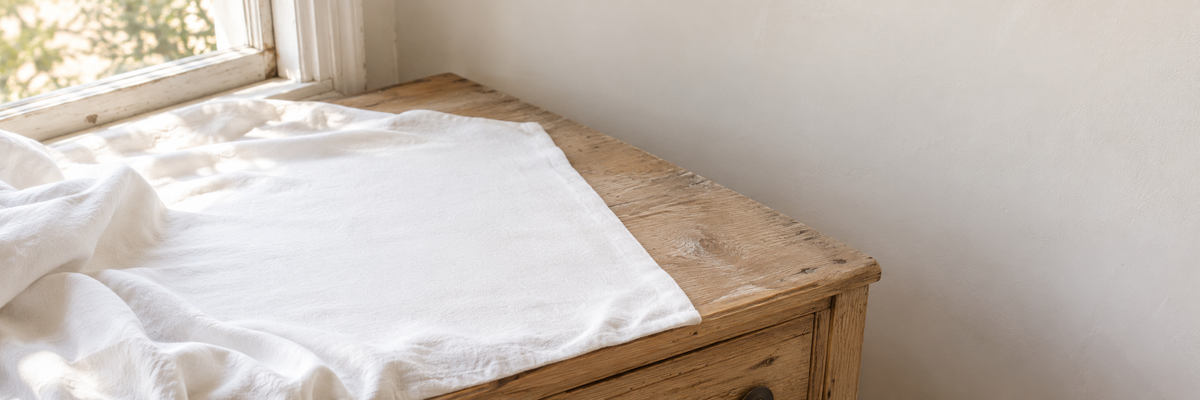 Empty dresser with draped cloth