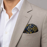 Navy and Gold Rugs pocket square — light jacket · wearing detail.