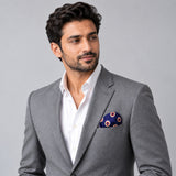 Navy Blue and Gold Reversible pocket square — model · light grey and open collar.
