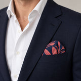 Navy Coral Laurel Leaf Silk Pocket Square — navy jacket · rounded puff.