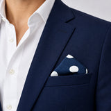 Navy Blue Polka Dots Medium pocket square — navy jacket · wearing detail.
