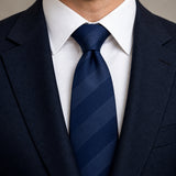 Navy Sateen Stripe Silk Tie — Knot and lapel close-up