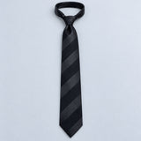 Noir Shadow Stripe Silk Tie — Relaxed knotted layout