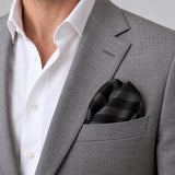 Noir Shadow Striped Silk Pocket Square — Light jacket · rounded puff