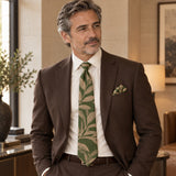 Olive Laurel Leaf silk tie and matching pocket square — Deep brown · relaxed portrait