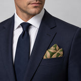 Olive Laurel Leaf Silk Pocket Square — formal model · navy and tie.