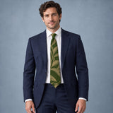 Olive Laurel Leaf Silk Tie — Navy suit portrait