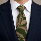 Olive Laurel Leaf Silk Tie — Knot and lapel close-up