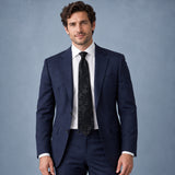 Onyx Damask Scroll Silk Tie — Navy suit portrait