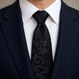 Onyx Damask Scroll Silk Tie — Knot and lapel close-up