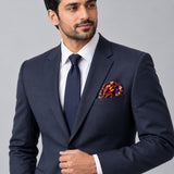 Maroon Paisley and Floral pocket square — formal model · navy and tie.