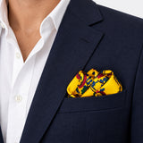 Paisley and Floral Mustard pocket square — navy jacket · wearing detail.