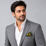 Olive Green Paisley and Floral pocket square — model · light grey and open collar.