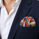 Paisley Art Show pocket square — navy jacket · wearing detail.