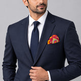 Paisley Shape pocket square — formal model · navy and tie.