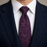 Plum Tropical Bloom Silk Tie — Knot and lapel close-up