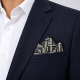 Rectangular Strips pocket square — navy jacket · alternate fold.