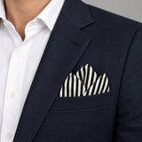 Retro Run pocket square — navy jacket · alternate fold.