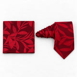 Scarlet Laurel Leaf silk tie and matching pocket square — Natural coiled pair