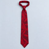 Scarlet Laurel Leaf Silk Tie — Relaxed knotted layout