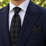 Shadow Checkerboard silk tie and matching pocket square — Navy peak lapel · pointed fold