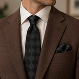 Shadow Checkerboard silk tie and matching pocket square — Tobacco brown · notch lapel
