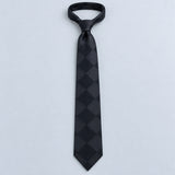 Shadow Checkerboard Silk Tie — Relaxed knotted layout