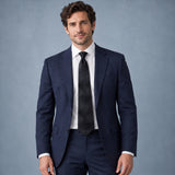 Shadow Checkerboard Silk Tie — Navy suit portrait