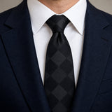 Shadow Checkerboard Silk Tie — Knot and lapel close-up
