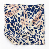 Snow Leopard pocket square — unfolded studio detail.