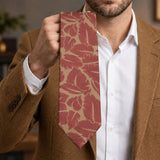 Terracotta Leaf Silhouette Silk Tie — Handheld tie blade detail