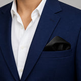 The Black Matter pocket square — navy jacket · wearing detail.